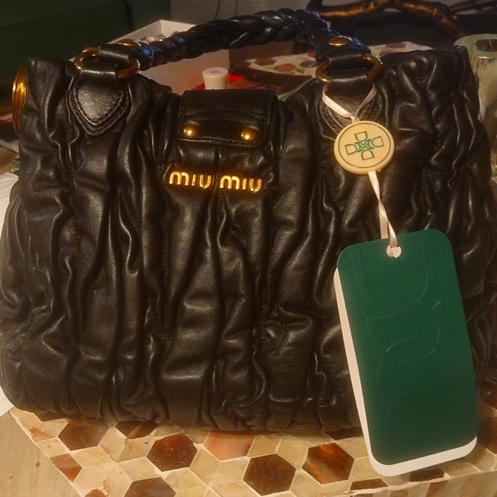 Coffee Convertible Tote bag soft Calf by Miu Miu. With it's dust bag.